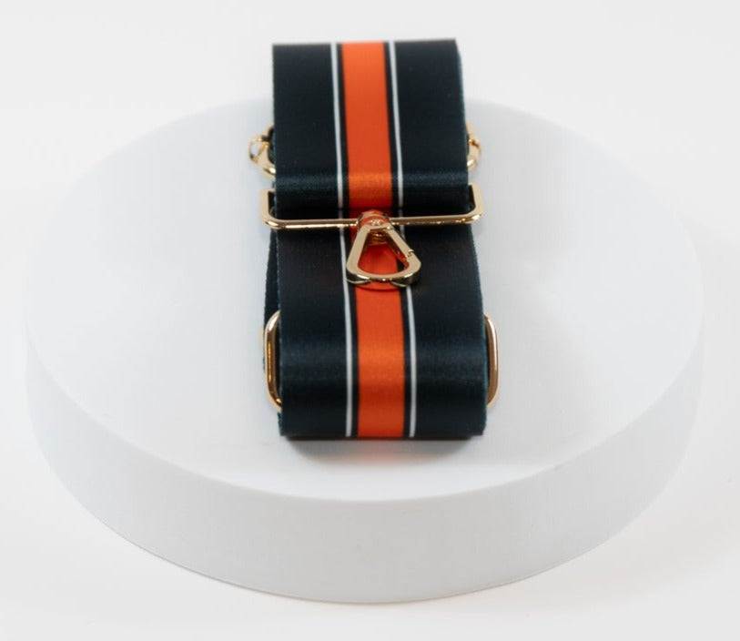 Elegant crossbody strap shown in Chicago Bears team colors