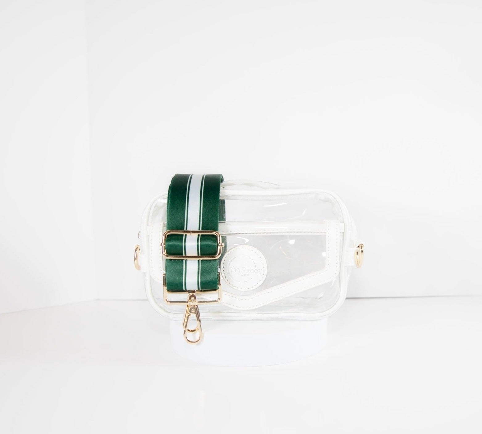 Clear Stadium Bag in white leather trim, front facing, with a crossbody strap in New York Jets team colors.