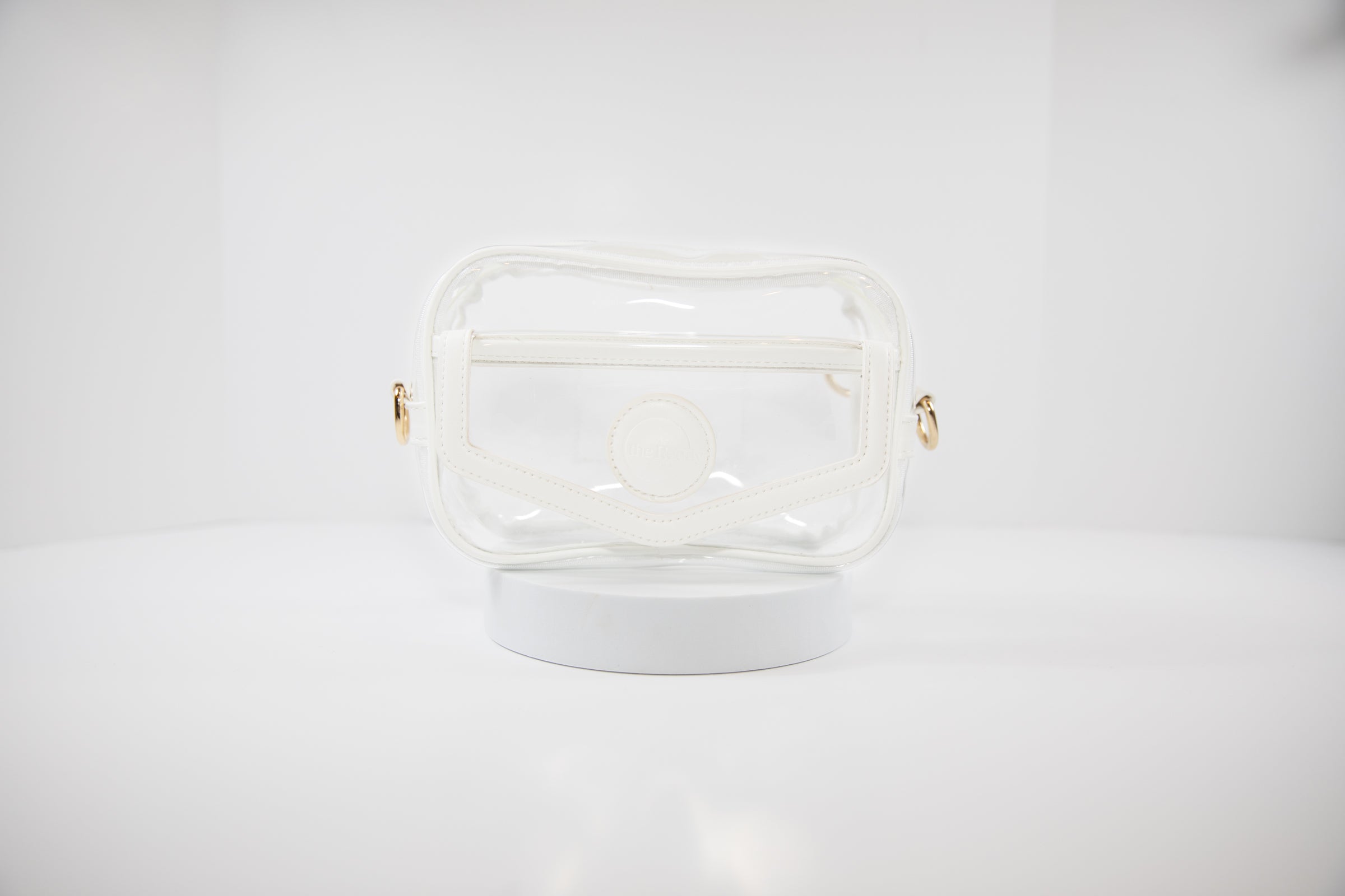 Clear Stadium Bag, front facing, that can be worn as a crossbody or body bag.