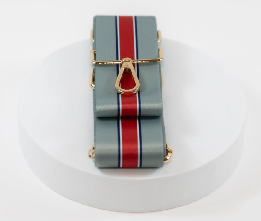 Elegant crossbody strap shown in New England Patriots team colors of silver, red, white and blue