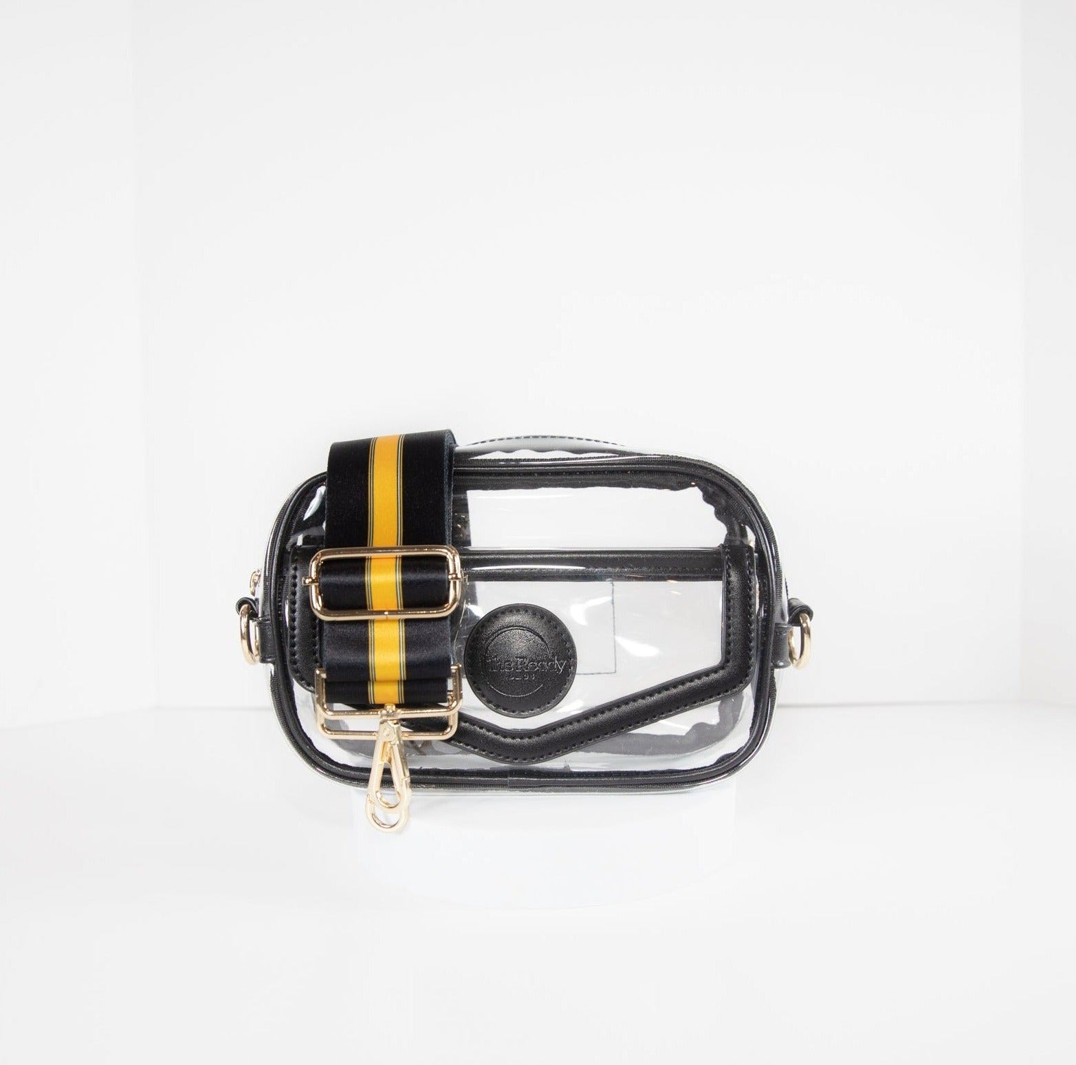 Clear stadium bag in black leather trim, front facing, with a crossbody strap in Pittsburgh Steeler black and gold.