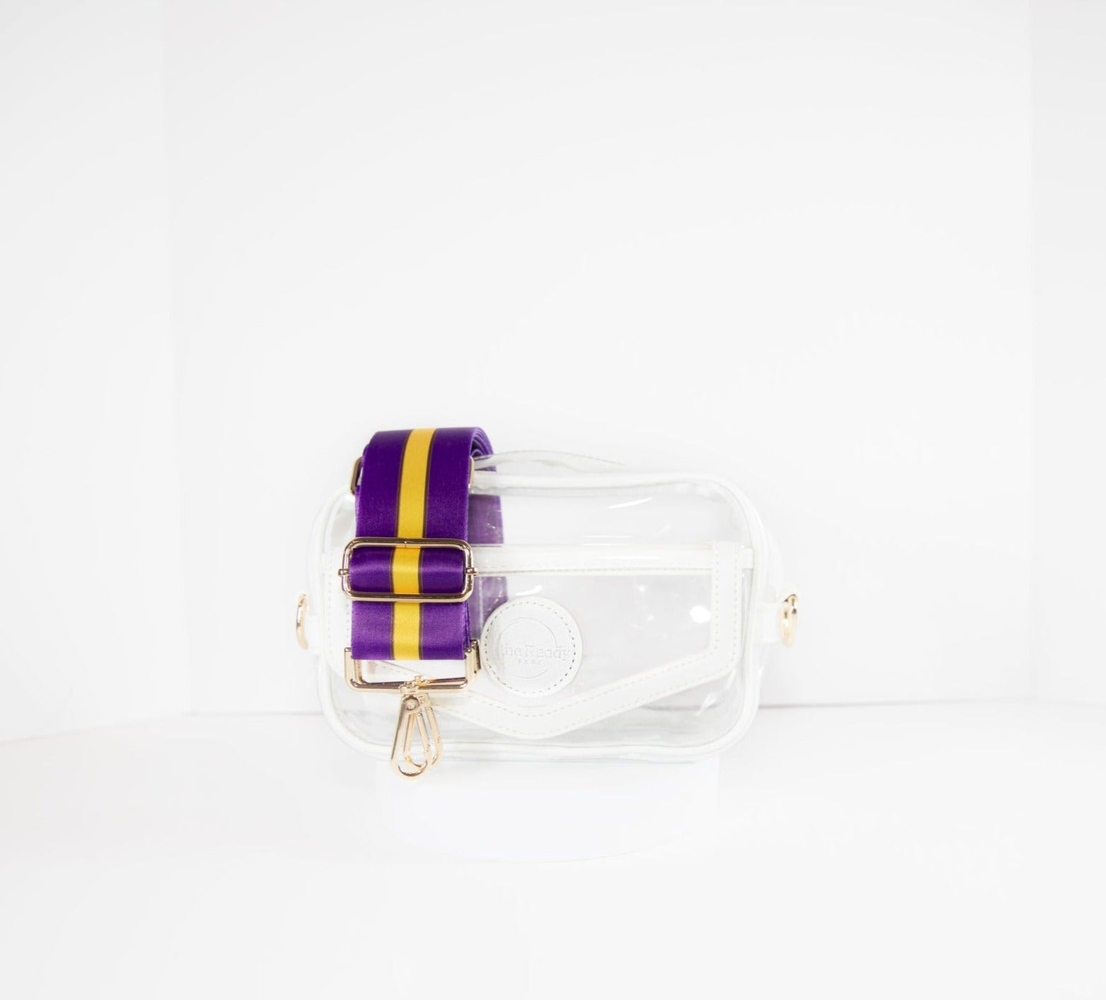 Clear Stadium Bag in white leather trim, front facing, with strap colors for LSU Tiger fans.