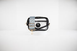 Clear Stadium bag in black leather trim with a crossbody strap in Chicago White Sox team colors.