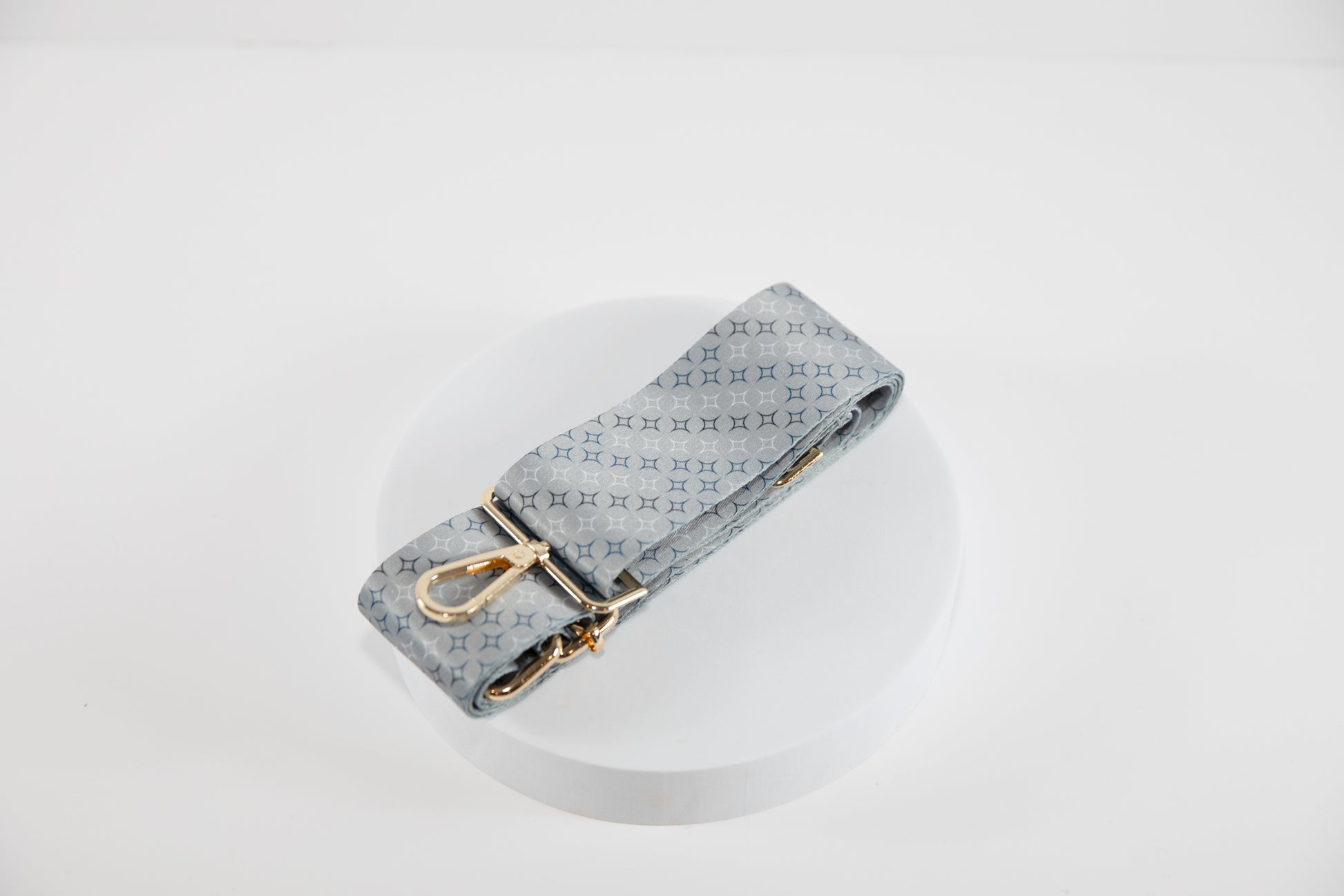 Elegant Crossbody strap shown in NY Yankees team colors of silver, blue white and black.