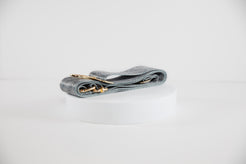 Elegant Crossbody strap shown in NY Yankees team colors of silver, blue white and black.