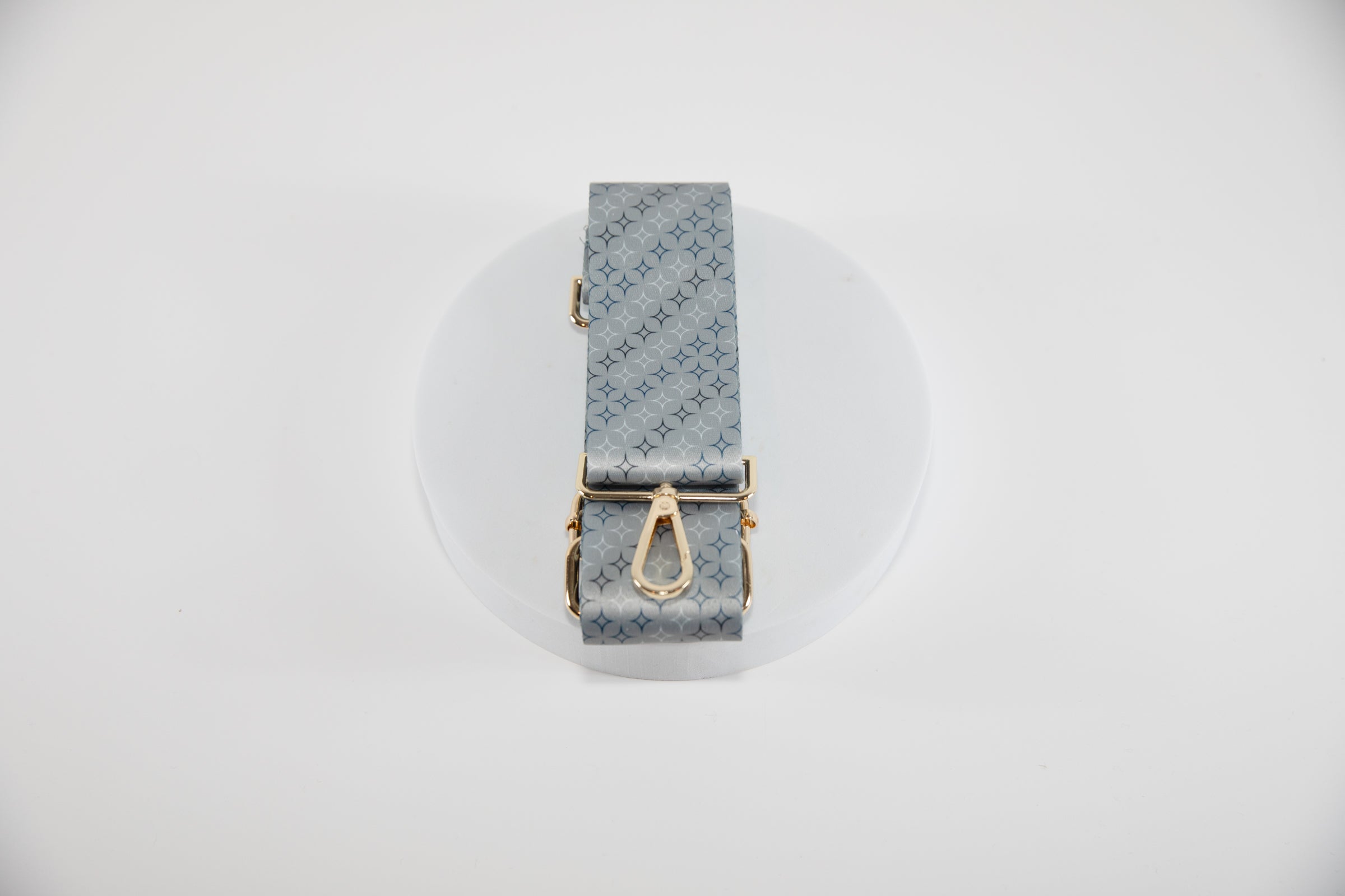 Elegant Crossbody strap shown in NY Yankees team colors of silver, blue white and black.