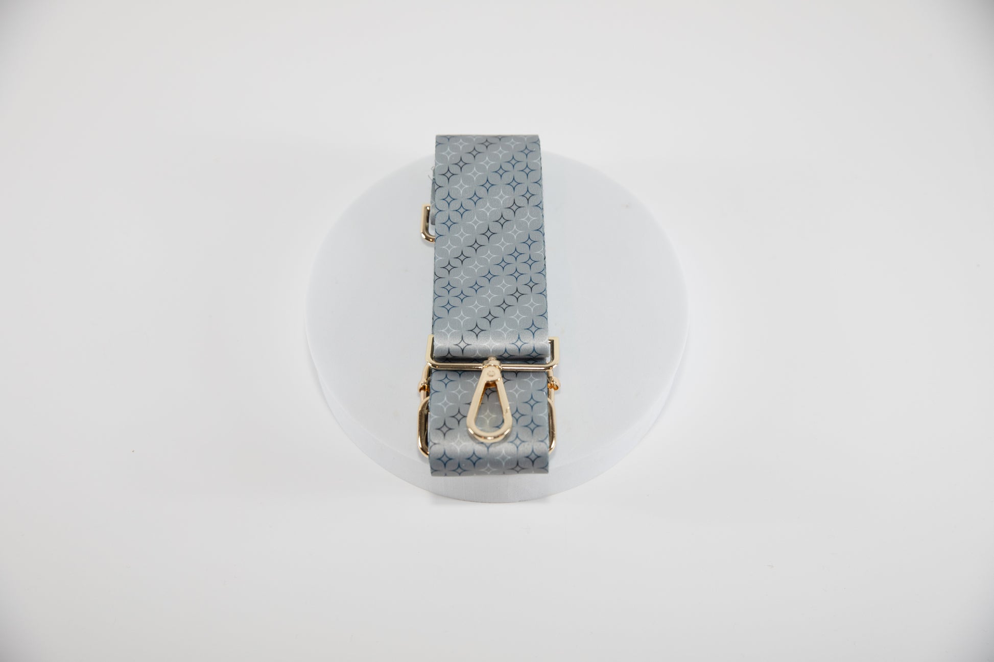 Elegant Crossbody strap shown in NY Yankees team colors of silver, blue white and black.