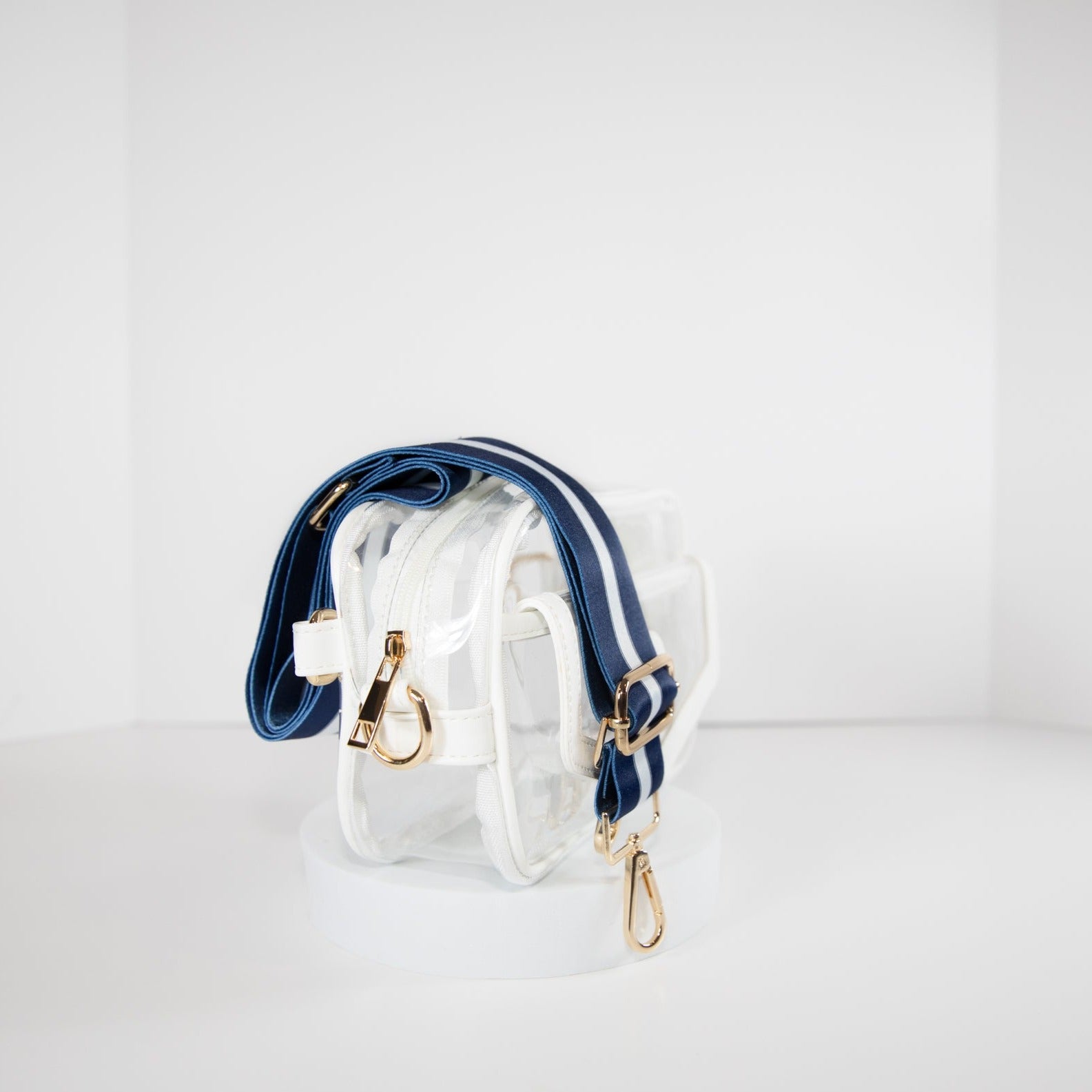 Clear stadium bag in white trim, side facing, with a crossbody strap in Penn State Nittany Lion colors.