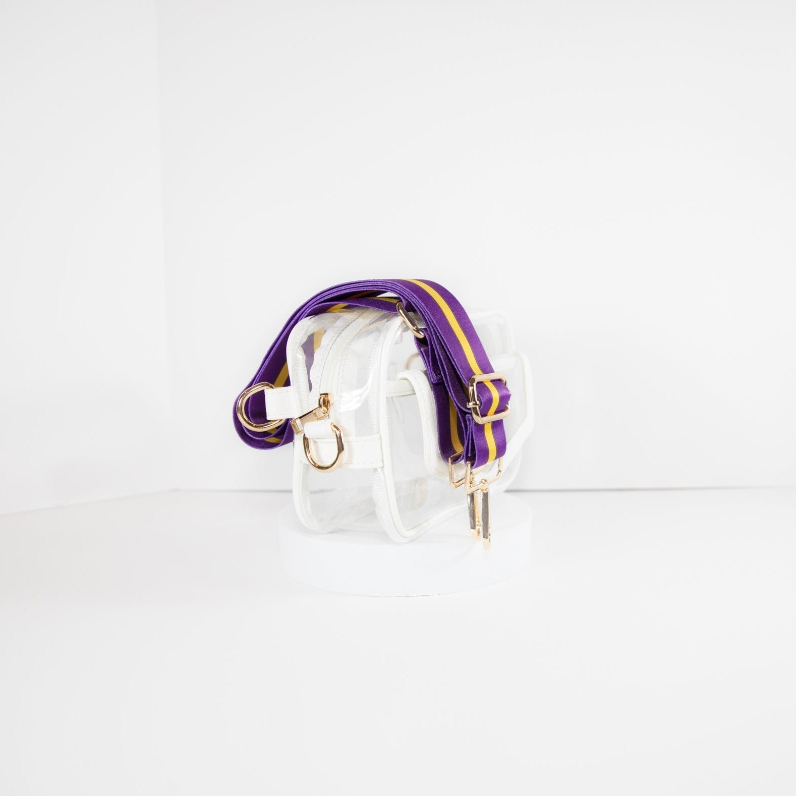 Clear Stadium Bag in white leather trim, side facing, with strap colors for LSU Tiger fans.